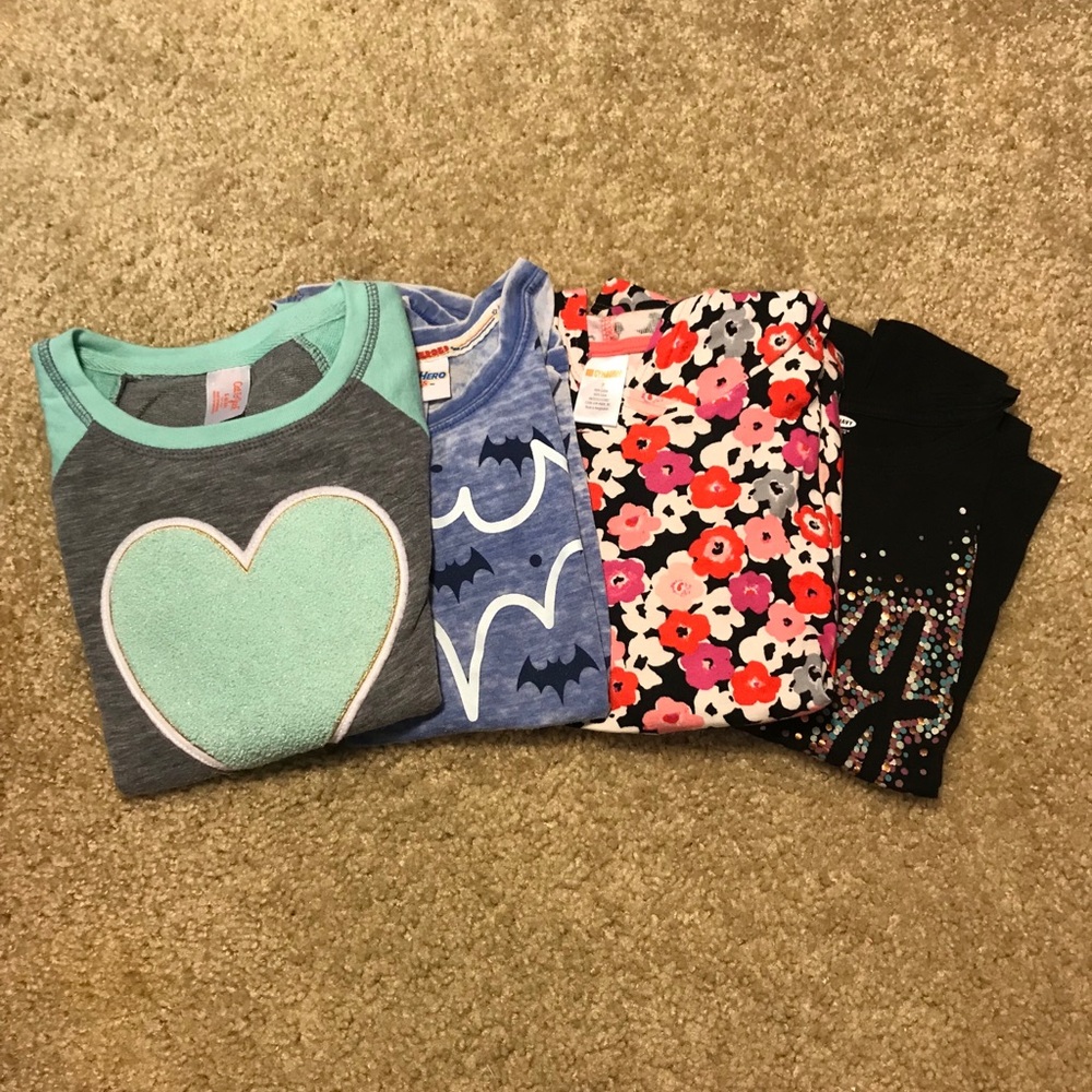 Set of 4 long sleeve shirts. Size S/M
